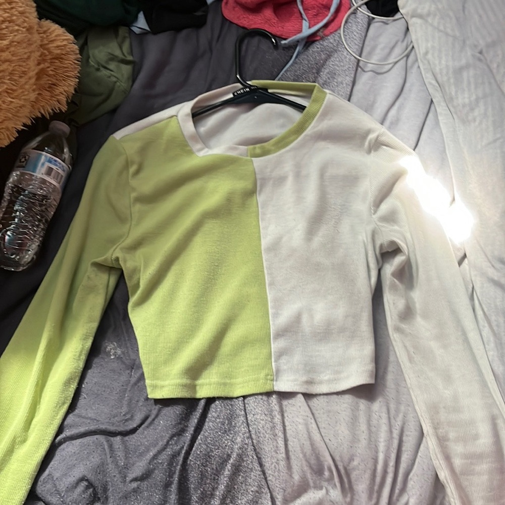 This is a long sleeve semi cropped shirt from stein